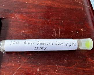 #32	100 silver Roosevelt Dimes in plastic roll	 $240.00 
