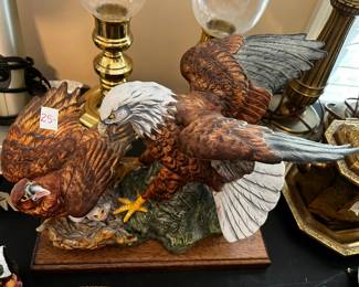 #152	Ceramic Eagle  on Wooden Stand	 $25.00 
