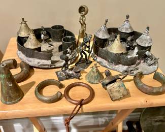 Rare Collection of African Artifacts Found Behind a Wall in an old house in Atlanta many years ago. The collection Includes rare pieces such as African Currency Bracelets and hand made metal figures.