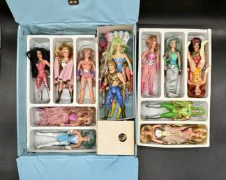 This Collection of She-Ra 16 action figures has 40+ total pieces including 16 action figures, rare She Ra Carry Castle Collectors Case from 1985 and accessories, shields, clothes, and a sword. The set is a 1st edition vintage collection.