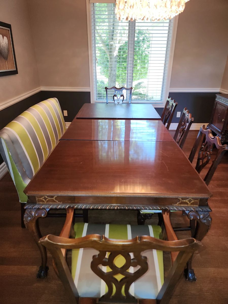 Antique mahogany dining table with leaves and protectors