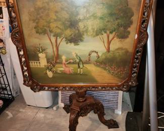 Tilt top painted glass table
