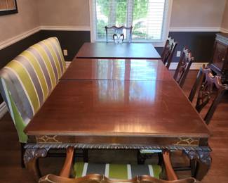 Antique mahogany dining table with leaves and protectors