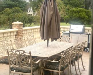 Outdoor table w/eight chairs and umbrella