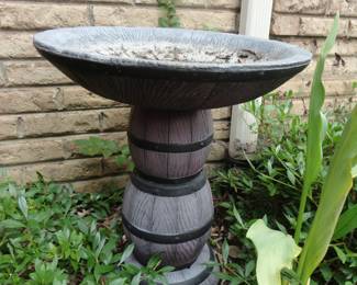 Several of these bird baths/Many planters that match this style in the yard