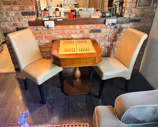 wide pic of game table with chairs.