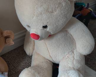 Large bear...There are many, many large and small stuffed animals throughout the home