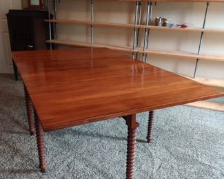Dining table with spindle legs/drop leaf.