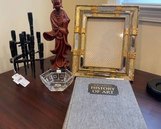 Asian themed candle, Decorative picture frame, History of Art hardcover by HW Janson, David Palumbo Iron Menorah
