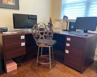 L-shaped desk, HP 2310m monitor, Panasonic pencil sharpener, Asian themed candle, Decorative picture frame, History of Art hardcover by HW Janson, David Palumbo Iron Menorah, ASUS monitor, Logitech keyboard