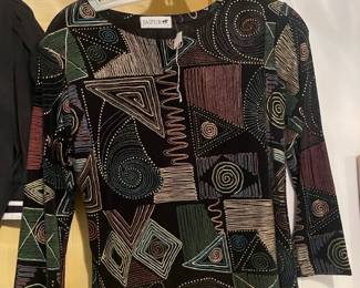 Women's clothing brands such as: Lafayette 148 New York, 5/48, Nic+Zoe, Violet & Claire, Christian Dior, Oscar De La Renta, Eco Ganik, Pearl's & Cashmere, Marc Bouwer, Theory, St. Croix