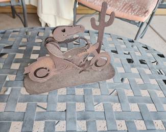 crap Metal Sculpture Skeleton Vulture Riding Motorcycle Through Desert