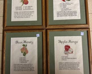 Framed hand needlework.