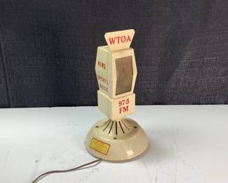 Lot 183
Antique, circa 1960’s “Mike Radio” by Universal Publicizers, Inc. Branded 97.5 WTOA, Trenton, NJ. Gets power. Faint static sound heard from radio. 14in tall