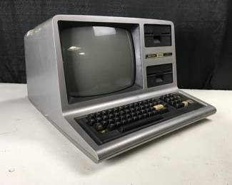 Lot 344
Vintage Computer Radio Shack TRS-80 Model III Microcomputer, Powers On But Does Not Seem Fully Functional, 13”H x 18”W x 20”D