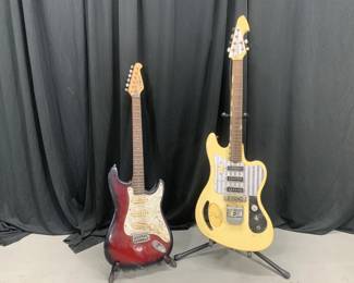 Lot 75
1980’s Lotus S-Style Electric Guitar Red Burst and 1960’s Teisco Del Rey Model ET 320 Monkey Grip With Damage Where Neck Meets The Body