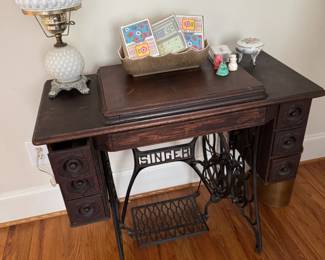 Singer sewing machine table with foot pedal
