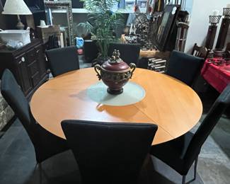 5' Round Wood Table w/6 Black Upholstered Chairs.