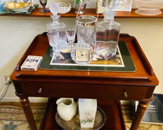 rich rolling antique bar /serving table solid with drawer.