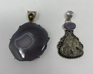 Left to Right

Gray Botswana Agate • Smokey Quartz• Sterling Pendant 

Pyrite • Amethyst • Sterling Pendant