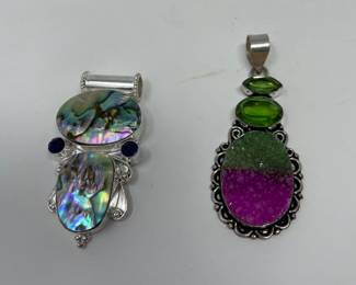 Left to Right

Abalone • Tanzanite Quartz • Sterling Pendant 

Multi Agate Druzy • Peridot • Sterling Pendant 
