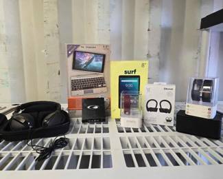 4054  Surf Onn Tablet, Gen Tek Bluetooth Headphones, iFitness watch with Bands, Nuvision Keyboard and More 