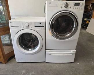 2514  LG Washer and Dryer with Storage Cabinet 