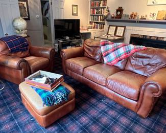 Leather couch and chair have some wear but are super comfy