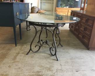 Glass top table with metal base