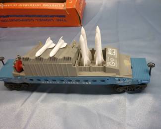 Another view of Lionel Trains Missile Firing Car No. 6544, Post-War 1960-64, with original box and 4 missiles (#44-40), white stamped control panel, with instruction sheet