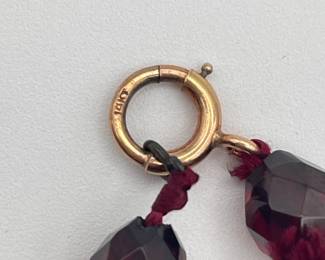 14kt gold clasp on one of the amber faceted beads necklaces