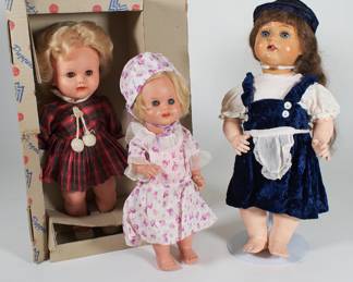 Three dolls, one in original box