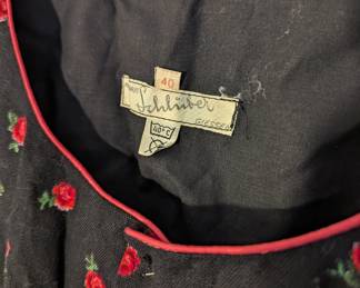 Closeup of women's short sleeve dress, German label