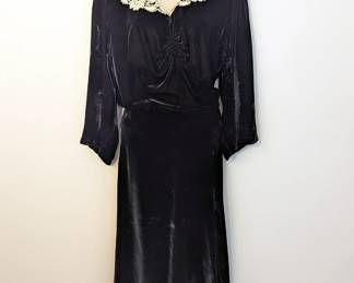 Women's dress, black velvet material with white lace collar, long sleeves