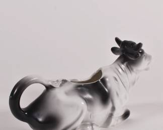Another view of antique German porcelain sitting Holstein cow creamer