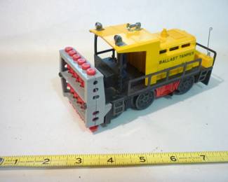Another view of Lionel Trains Ballast Tamper Locomotive No. 54, Post -War 1958-61, with track clip