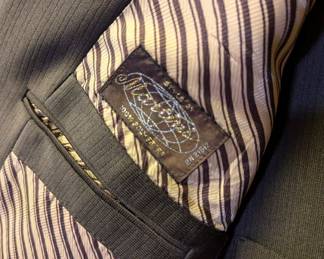 Label inside suit with single-button closure blazer, vest and trousers, size 43