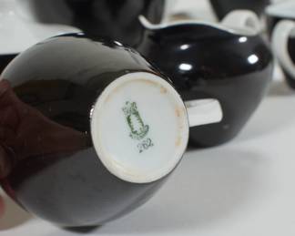 Closeup of Schönwald Porcelain, Mid Century Modern coffee/tea set. Coffee pot, sugar bowl and four coffee cups with saucers