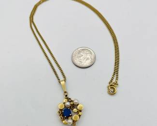 Another view of 8kt gold necklace with pendant
