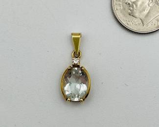14kt gold pendant with clear stone