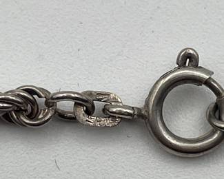 Closeup of clasp on sterling silver necklace with Mano Figa pendant