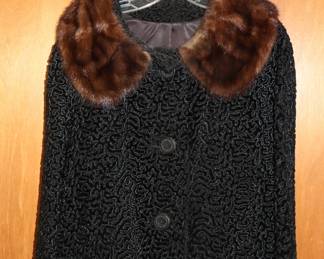 Women's black long-sleeve button-front top with fur collar