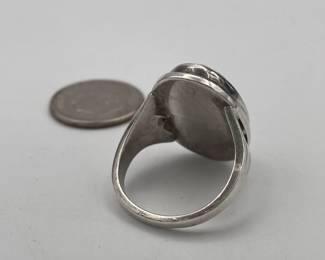 Closeup of rose cameo silver ring