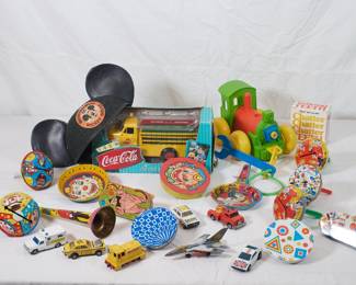 Vintage noisemakers, a Walt Disney World Mickey Mouse hat, and Ertl die-cast 1953 Coca Cola truck bank in original box