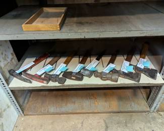 Vintage hammers and hatchets including bricklayer's / Mason's hammer, blacksmith hammer, carpenter's shingling hatchet, blacksmith sledge, ball peen sledge 