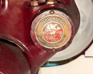 Closeup of vintage American Slicing Machine Co. meat and cheese slicer. Commercial grade item made in Chicago, Ill. Heavy duty cast iron construction