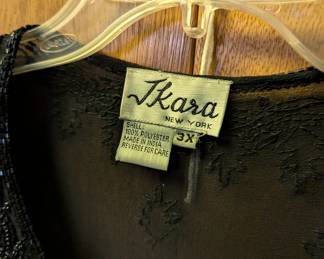 Closeup of Jkara New York women's beaded polyester blouse, black, long sleeves, size 3X