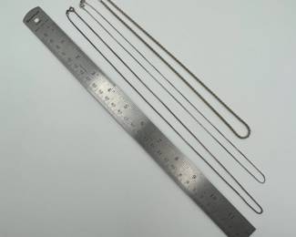 Another view of sterling silver chain necklaces of different lengths