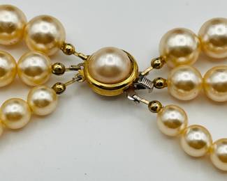 Clasp on classic 1950’s three strand Faux Pearl necklace