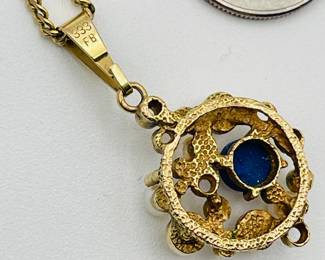 Reverse view of 8kt gold necklace with pendant